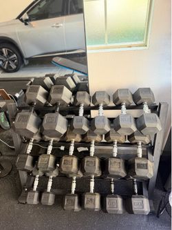 Weights 20lbs - 65 lbs and weight rack