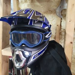 Kids ONEIL medium motocross helmet with goggles