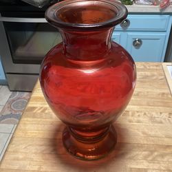 Very large red glass urn