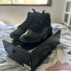 Jordan 11 Cap And Gown In Black 