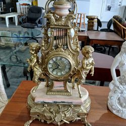 A gold clock statue