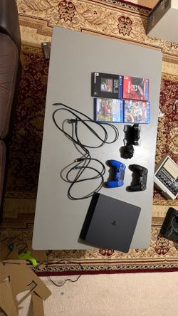 PS4 Slim 1TB Bundle - Perfect Condition (2 Controllers, Charging Dock + 4 Games)