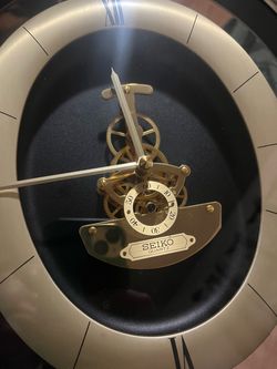 Vintage Seiko Quartz Skeleton Wall Clock QAX201G Gold Tone Frame Roman Numerals