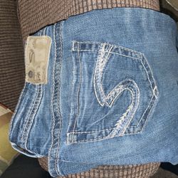 Women’s Size 27 Silver Low Rise Boot Cut Jeans