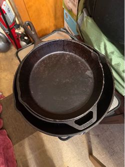 Set of three cast iron skillets