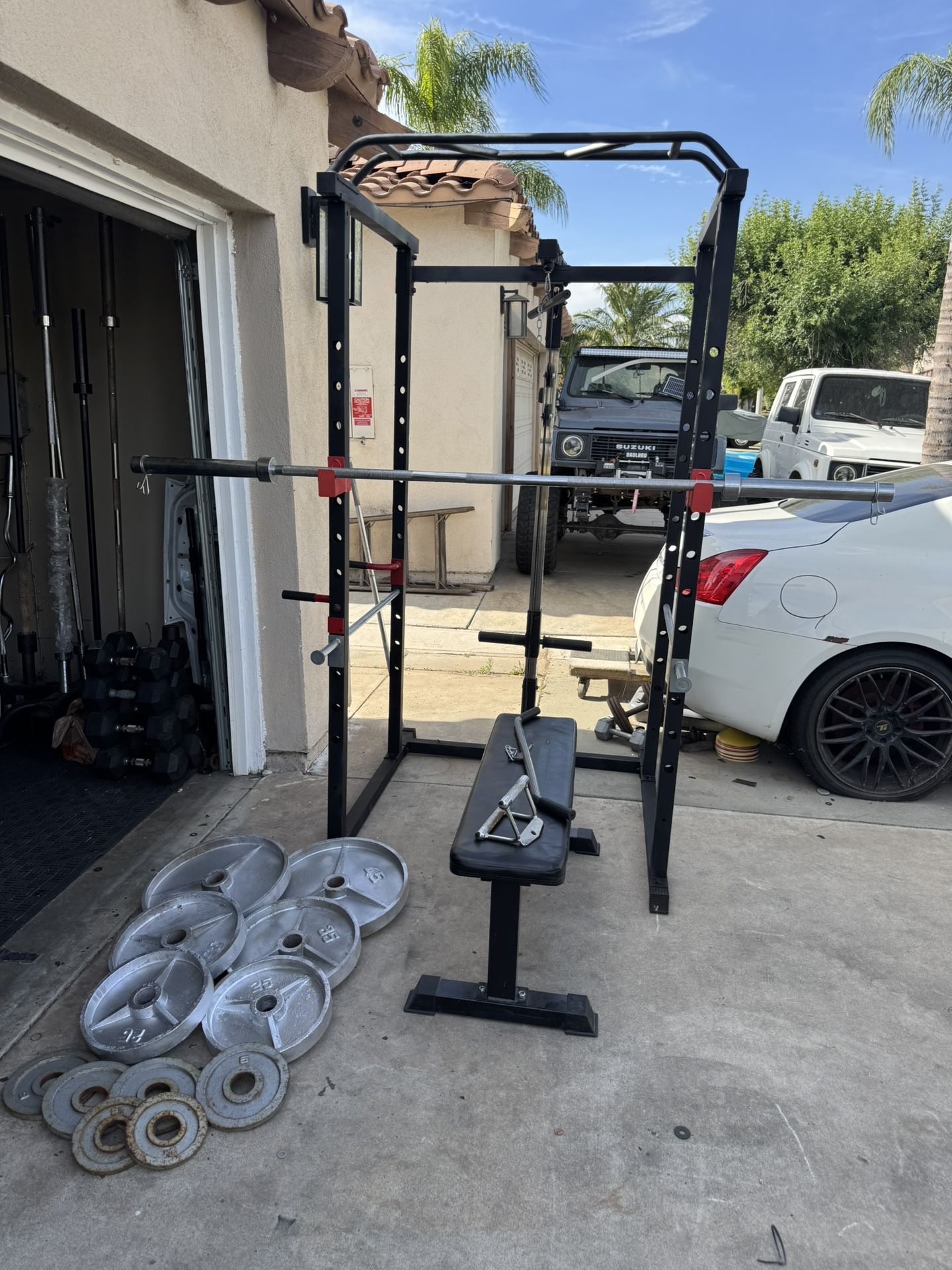 Bench press/squat rack with 7ft bar plus 235lbs of Olympic weights