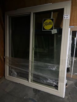Pella Sliding Window Tan Frame