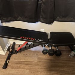 Workout bench and dumbbells