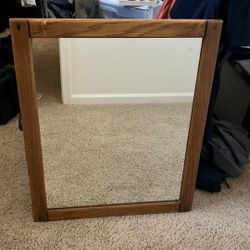 Mirror with solid wood frame