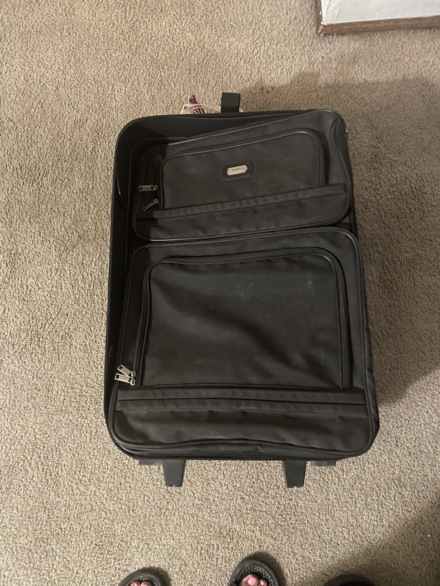Checked Suitcase And Carry On Suitcase