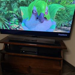 65” Samsung TV with Cherrywood With Smoked Glass  Tv Stand. 
