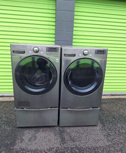 LG STEAM IN STAINLESS STEEL WASHER 4.5 CUBFT & GAS DRYER 7.5 CUBFT 27”W WITH PEDESTAL