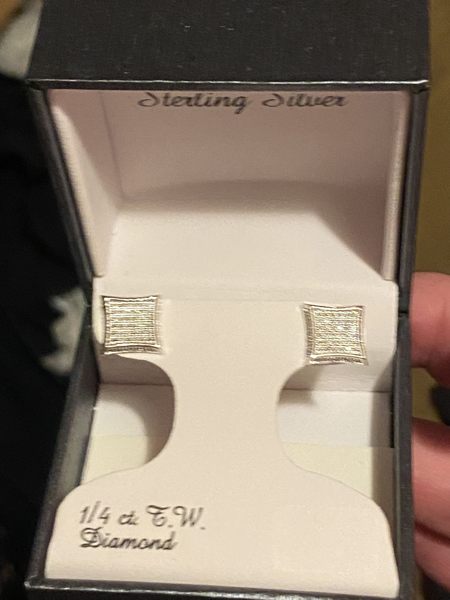 1/3 Cttw White Good over Sterling Silver Diamond Earrings.