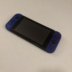 Nintendo Switch w/ Zelda Controllers, Extra Grey And Green Controllers, Joycon Grips, And 2D Mario Pro Controller. I’m