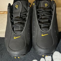 Nike NOCTA Hot Step Air Terra in the "Black University Gold”