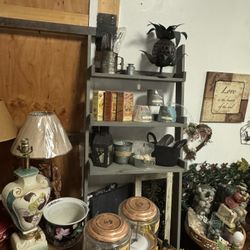 Shelves Gray put over toilet or use how you like  6 foot tall and is 2.1 ft wide 10deep airport Dr a