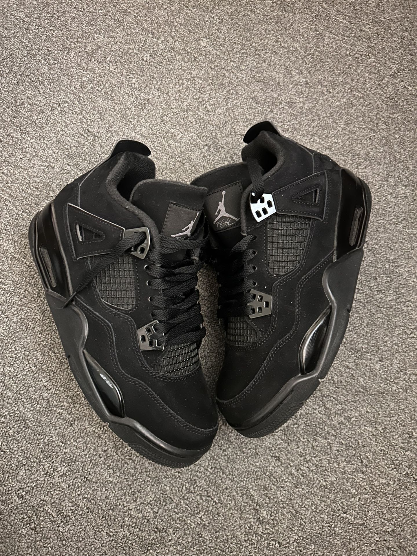 size 7 jordan 4 black cat