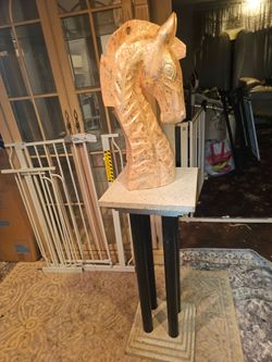 Price is firm.. beautiful porcelain horse head in pedestal
