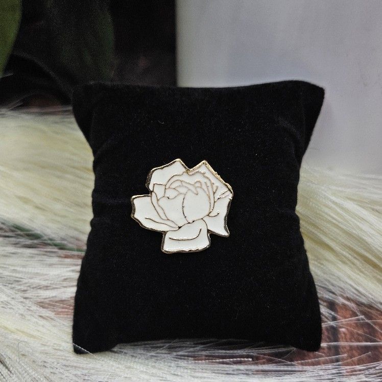 Rose Shaped Brooch Pin White Enamel Gold Tone etched with gold to outline and define the shape approximate 1"