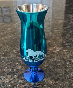 MGM Las Vegas Souvenir hurricane glass featuring a metallic blue finish