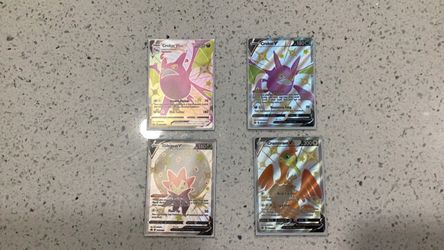 Four shiny Pokémon cards