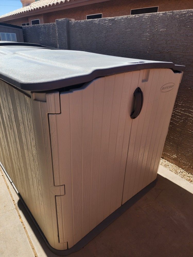 2 Suncast Glide Top Sheds 4' H x 6.5' D x 4.5' W