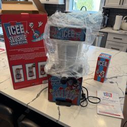 ICEE Machine with 4 cups, 4 straws, and 4 new syrup bottles