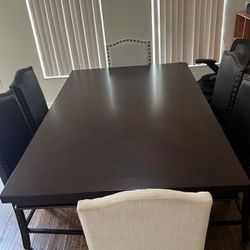 Dining Room Brown Wood Table And Six Chairs 