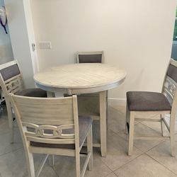 Breakfast Table 41” Diameter 36” Height with 4 matching chairs