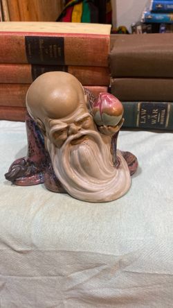 Antique ceramic statue