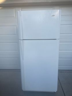Amana top and bottom refrigerator for $180. Dimensions are 30Wx30Dx66H. Pick up only.