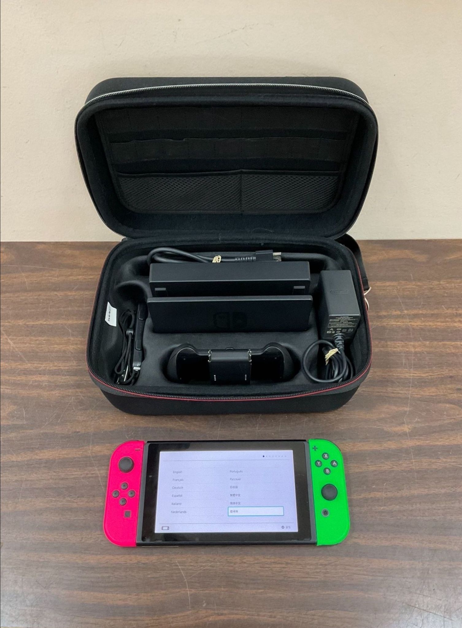 NINTENDO SWITCH HAC-001 W/ NEON GREEN/PINK JOY-CON,DOCK, CABLES IN CARRYING CASE