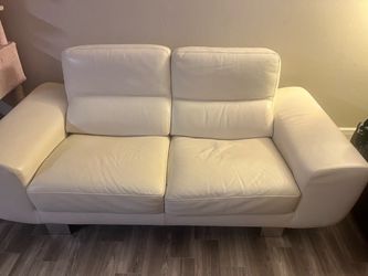 White leather loveseat couch