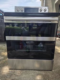 Samsung  double oven with convection and stove top.