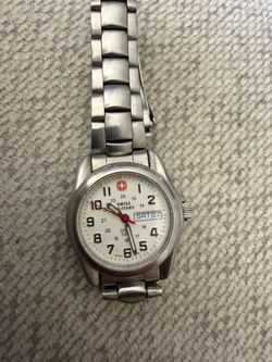 Swiss made ladies stainless steel watch, not gucci, Movado, omega
