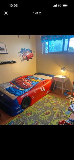 Kids twin car bed and decorative items