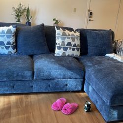 Sectional Sofa With Pull Out And Storage