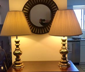 MCM pair of brass lamps 32” from Berman w/lampshades.