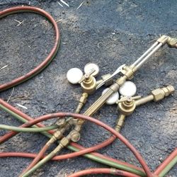 Cutting torch and hose with clocks