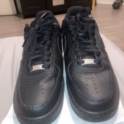 Nike Black Air Force Ones.