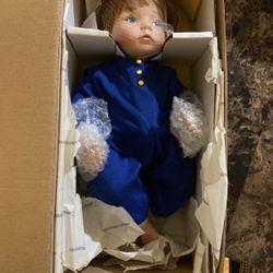 Porcelain baby doll you deserve a break today with Ronald McDonald figure