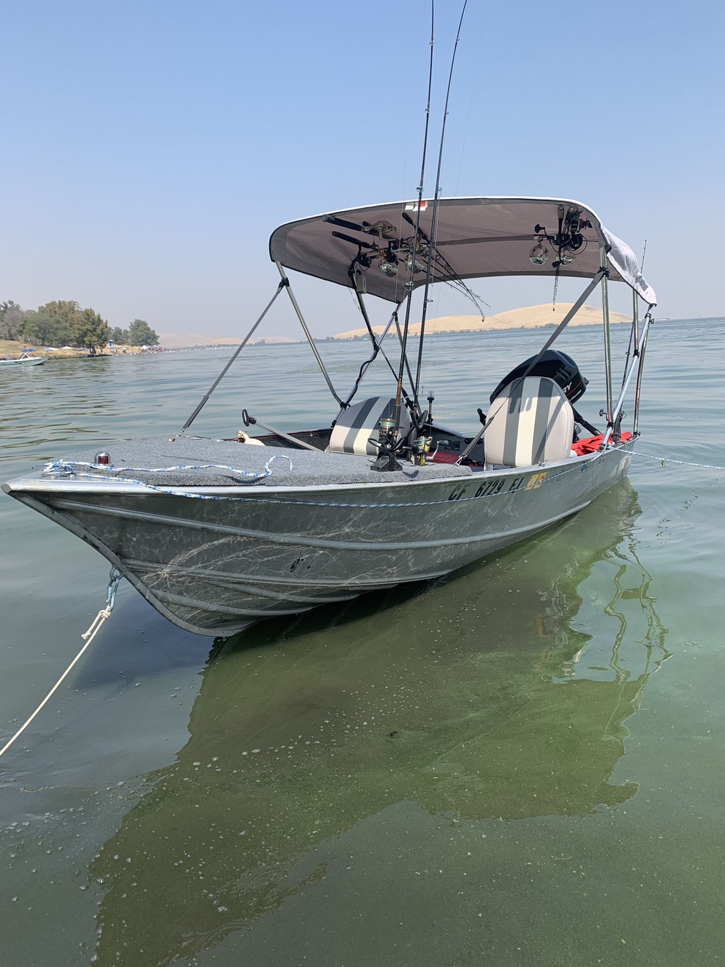 14ft GREGER comes with Mercury 25HP Four stroke Big foot ,Boat comes with Trailer , speakers , Fish Finder, bimi top , rod holders storage space has