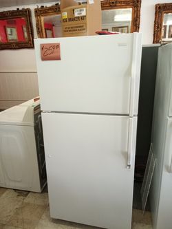 White Refrigerator ex large excellent . Warranty , Delivery available 2203 Fowler st. Ft. Myers 33901