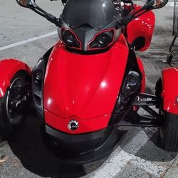 can am spyder 09 in perfect condition with only 12 miles it has tires and rims suitcases and music all up to date and several extras 