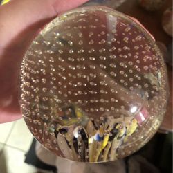 Vintage bullicante controlled bubble glass paperweight with flowers inside