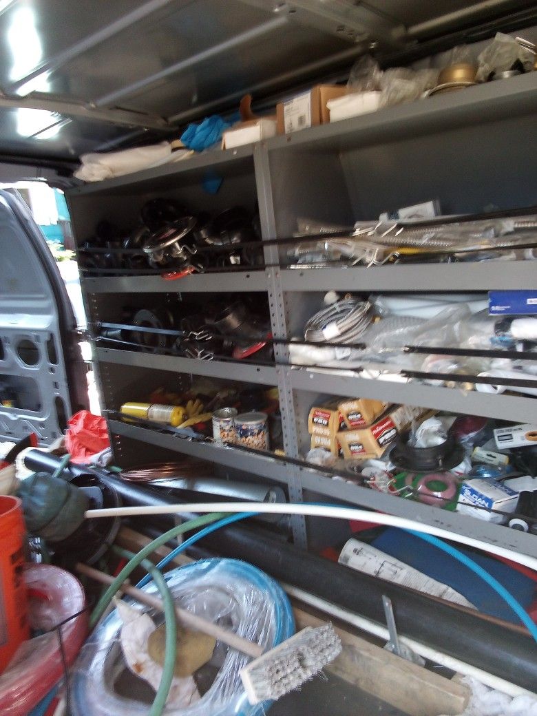Plumbing Materials And Parts New/Unused-also  2 Ladders 