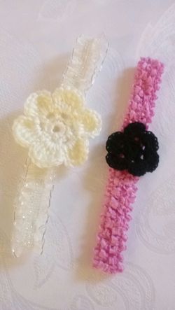 Baby girl headbands, hand crafted, made with acrylic yarns, new, fit 6months up to 12months, $1.00 each.