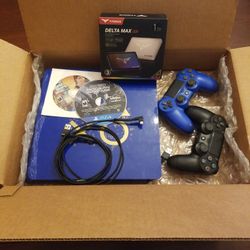 Playstation 4 Slim, New 1TB SSD, 2x Controller, 2x Games, Refurbished With 2 Games.