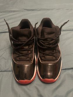 Retro “Bred” Jordan 11 low