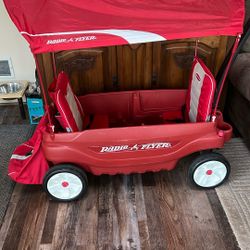 Radio flyer Double Seated Canopied Wagon With Large Packing Backpack And Back Of Seat Pockets